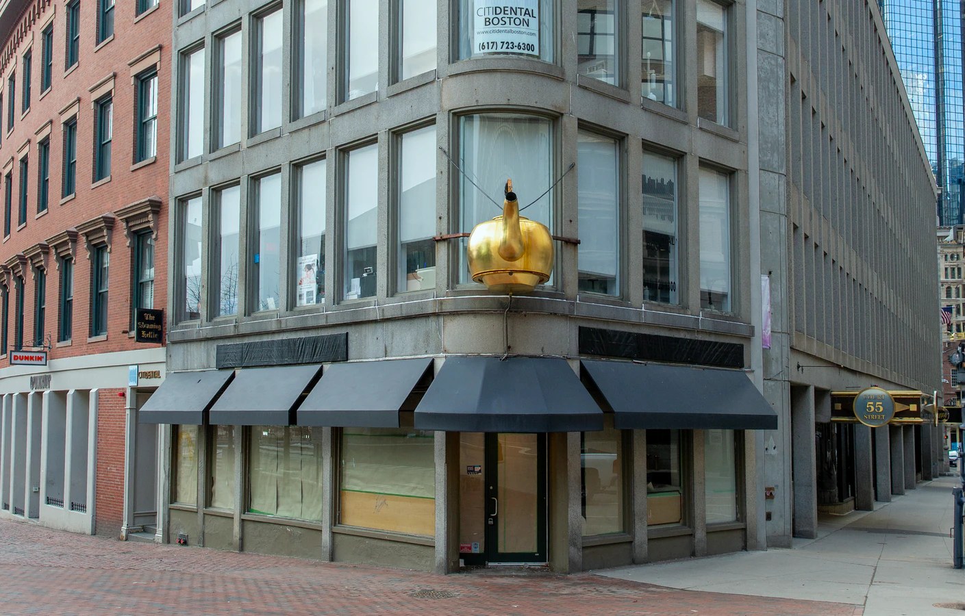 Option three: the vacant corner beneath the gold Steaming Kettle on Court Street